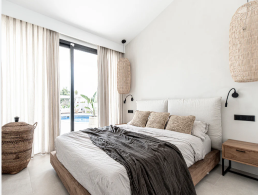 Cozy hotel room interior with comfortable bedding at Mayur Guest House